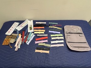 lot 22C image: Collection of 27 Assorted Apple Watch Bands with Organizer Roll