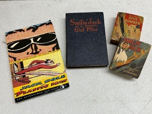 lot 103C image: Collection of 4 Vintage Comic and Adventure Books Featuring Smilin Jack and Plastic Man