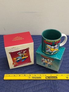 lot 117C image: Hallmark Bugs Bunny Keepsake Ornament and Disney Plane Crazy Mug