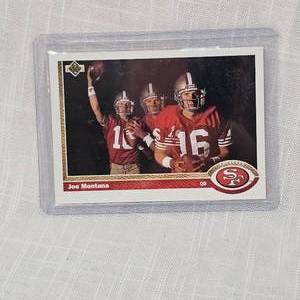 lot 115 image: 2-Joe Montana UpperDeck Cards in Cases
