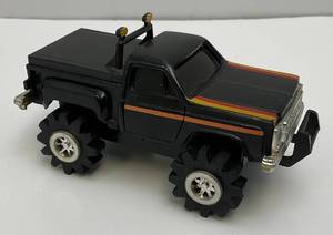 lot 100 image: 1980s Schaper Stomper 4x4 Chevy Pickup
