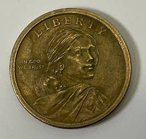 lot 6 image: RARE No Date Or Mint Mark Sacagawea Native American Dollar Native Woman Planting Corn On Reverse