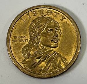 lot 16 image: RARE No Date Or Mint Mark Sacagawea Native American Dollar Native Woman Planting Corn On Reverse