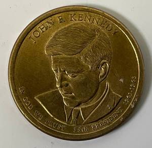 lot 24 image: 1961-1963 USA Presidential $1 Coin John F. Kennedy No Mint Mark
