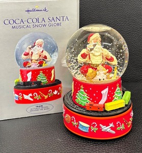 lot 74 image: Hallmark Coca-Cola Santa Musical Snow Globe