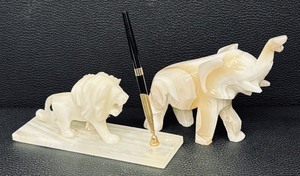 lot 101 image: Marble Elephant Figurine and Lion Desk Pen Holder