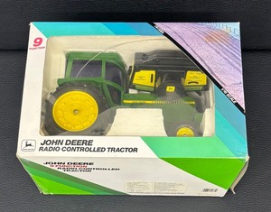 lot 189 image: John Deere 9 Function Radio Controlled Tractor