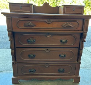 lot 19 image: Antique Victorian Walnut Step Back Dresser with Ornate Carvings