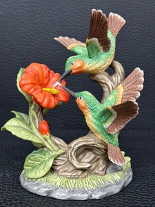 lot 30 image: Bisque Porcelain Figurine of Ruby-Throated Hummingbirds with Hibiscus