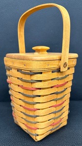 lot 88 image: Longaberger Handwoven Peg Basket with Lid and Handle