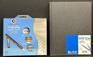 lot 100 image: Sheaffer Classic Calligraphy Pen Set with Blick Hardbound Sketch Book