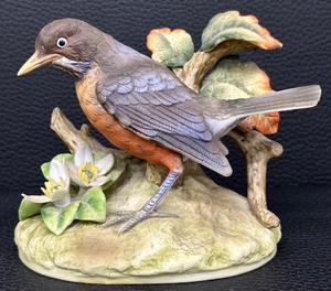 lot 102 image: Andrea by Sadek Robin Porcelain Figurine with Flowers