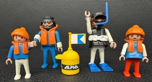lot 134 image: Vintage Playmobil Scuba Diver and Crew Figures with Buoy and Flag