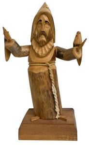 lot 212 image: Antonio Ortega 1999 Carved Wooden Figure of Man with Birds, 13 Inches Tall
