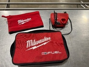 lot 118 image: Milwaukee M12 Charger and Two Milwaukee Bags