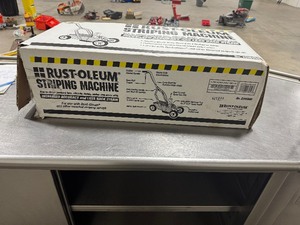 lot 65 image: Rust-Oleum Striping Machine for Parking Lots, Athletic Fields and more.  (Appears unused.)