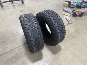lot 79 image: Two Goodyear Tires - Goodyear Wrangler Duratrack Tire 265-70-R17. Goodyear Ultra Terrain AT Tire 265-70-R17.