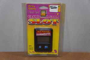 lot 202 image: Handheld Casino Action Slot Game
