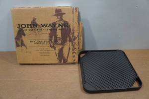 lot 231 image: John Wayne 10.5 Double Sided Cast Iron Griddle