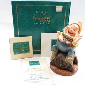lot 8 image: WDCC Snow White Happy, thats me Happy Dwarf Figure