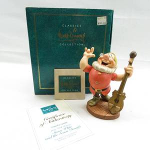 lot 10 image: WDCC Snow White Cheerful Leader Doc Dwarf Figure
