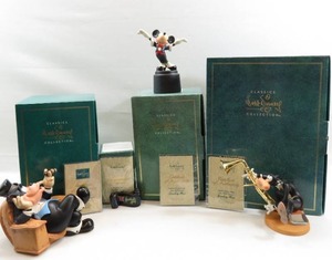 lot 102 image: WDCC Symphony Hour Lot of 4 - Goofy, Mickey, Sylvester, Title