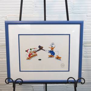 lot 187 image: 20 x17 The Face Off Sericel derived from the Hockey Champ Donald Duck, Hewie, Dewey and Louie
