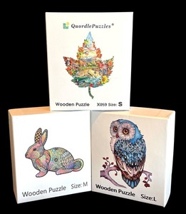lot 101R image: P - Set of 3 Quordle Wooden Puzzles