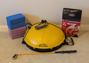 lot 136 image: LL - Exercise Equipment Lot with Yoga Blocks, Body Dome, 26 in Massage Ball, and Swing Trainer