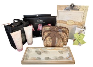 lot 177 image: UL - Gift Set with Mary Kay Lotions, Wine Glass Shades, Organizer Bags, Memo Pads, and Pinecone Tray