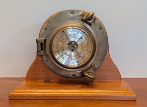 lot 226 image: O - Crandall Nautical Brass Porthole Barometer on Wood Stand