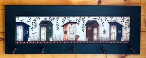 lot 37D image: Wall-Mounted Wooden Coat Rack with Painted Beach Hut Design