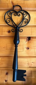 lot 39D image: Decorative 31-Inch Metal Key Wall Hanging with Heart Design