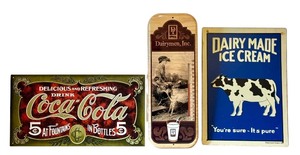lot 99D image: LR - Collection of 3 Vintage Style Metal Signs Including Coca-Cola, Dairymen Thermometer, and Dairy Made Ice Cream