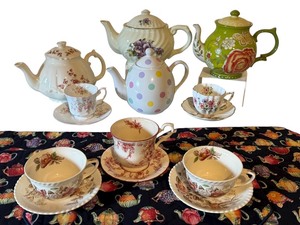 lot 111D image: Collection of 3 English Teapots, 4 Bone China Cup and Saucer Sets, and 5 Teapot Print Placemats