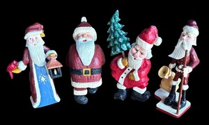 lot 136R image: P - Set of 4 Hand-Carved Wooden Santa Figurines by Pobbie Crafty Crafts