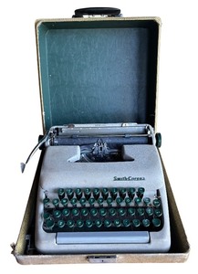 lot 180R image: P - Vintage Smith-Corona Sterling Portable Typewriter with Case