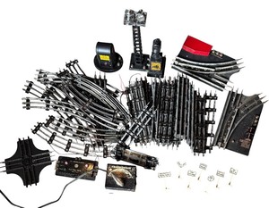 lot 341R image: K - Vintage Train Tracks with Electrical Accessories and Signs