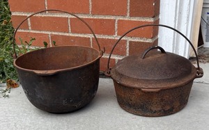 lot 342R image: G - Two Vintage Cast-Iron Pots with Bail Handles