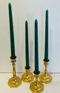 lot 144C image: LR - Set of 4 Brass Taper Candle Holders with Green Candles, Tallest 7 Inches