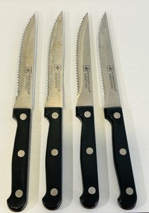 lot 154CC image: LR - Set of 4 International Supreme Cutlery Serrated Steak Knives