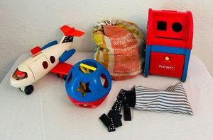 lot 155C image: LR - Vintage Fisher-Price Jet, Playskool Postal Station, Shape Sorter, and Dominoes Set