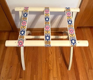 lot 22 image: Vintage Wooden Luggage Rack with Floral Woven Straps
