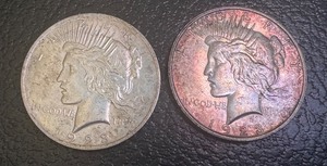 lot 31X image: Pair of 1923 Peace Silver Dollars