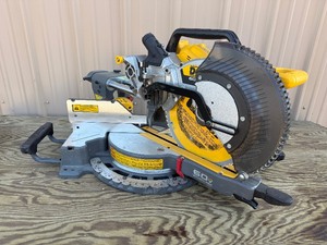 lot 08 image: DEWALT 60V MAX BRUSHLESS CORDLESS 12 IN. DOUBLE BEVEL SLIDING MITER SAW - USED LIKE NEW - MSRP $699
