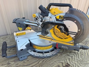 lot 09 image: DEWALT 60V MAX BRUSHLESS CORDLESS 12 IN. DOUBLE BEVEL SLIDING MITER SAW - USED LIKE NEW - MSRP $699