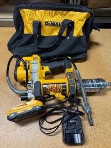 lot 23 image: Dewalt 20V MAX 10,000 PSI Variable Speed Grease Gun  1 20V MAX 3.0 Battery, Charger, Bag - LIGHTLY USED - MSRP $380
