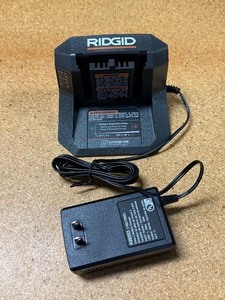 lot 31 image: Ridgid 18V Lithium Ion Charger -NEW-no box- MSRP $43