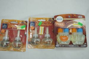 lot 80 image: Febreze Plugs (1 package with 2) & Glade Plugins Scented Oil (2 packages with 2 each)