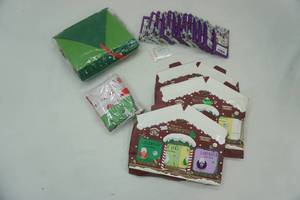 lot 95 image: Christmas Themed Beauty Products and Party Decor